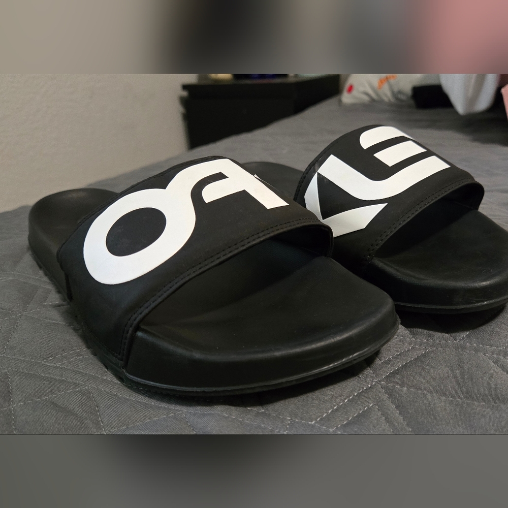 Oakley slides sandals.  Size 10
